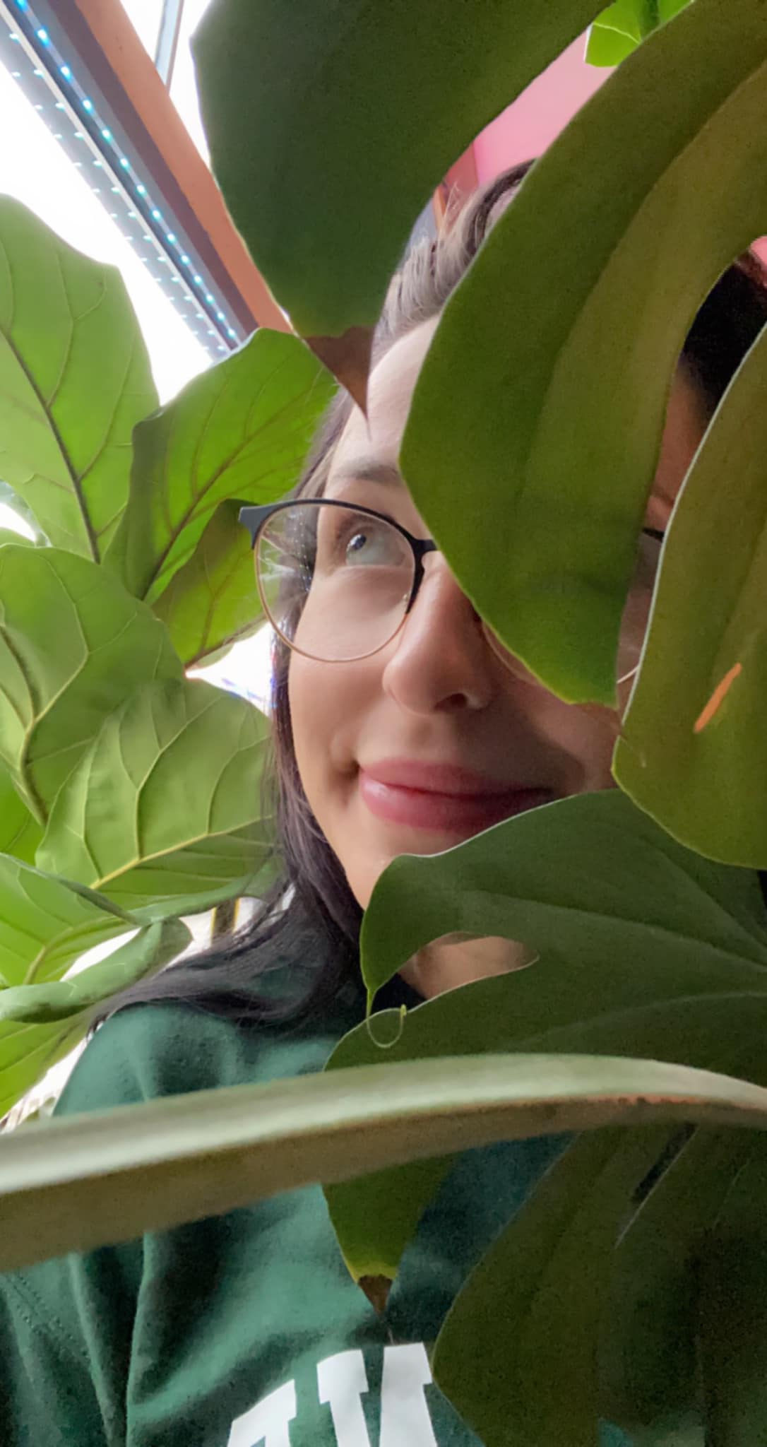 Bree behind plant Bree behind plant